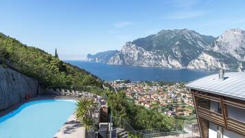 Seasonal outdoor pool, open 9 AM to 8 PM, pool umbrellas, sun loungers