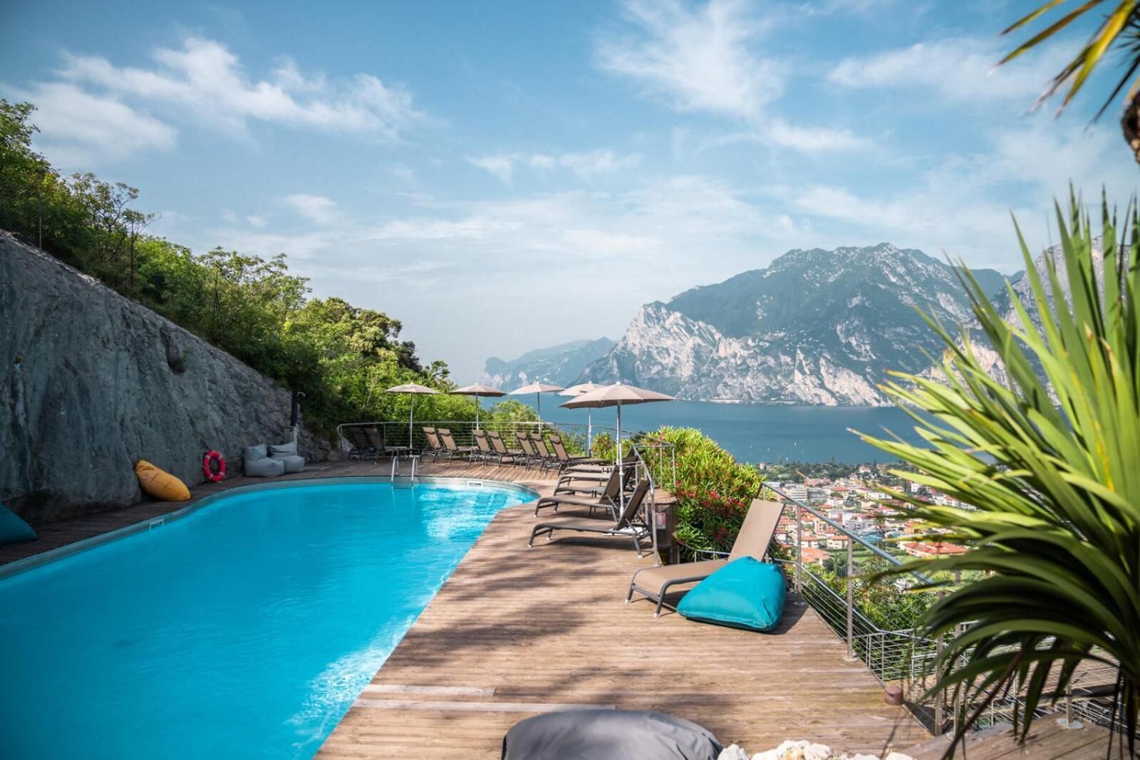 seasonal outdoor pool, open 9 am to 8 pm, pool umbrellas, pool loungers