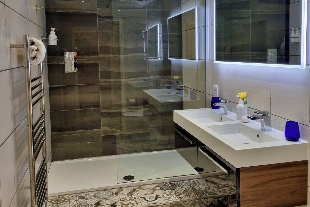Superior Room | Bathroom | Designer toiletries, hair dryer, towels