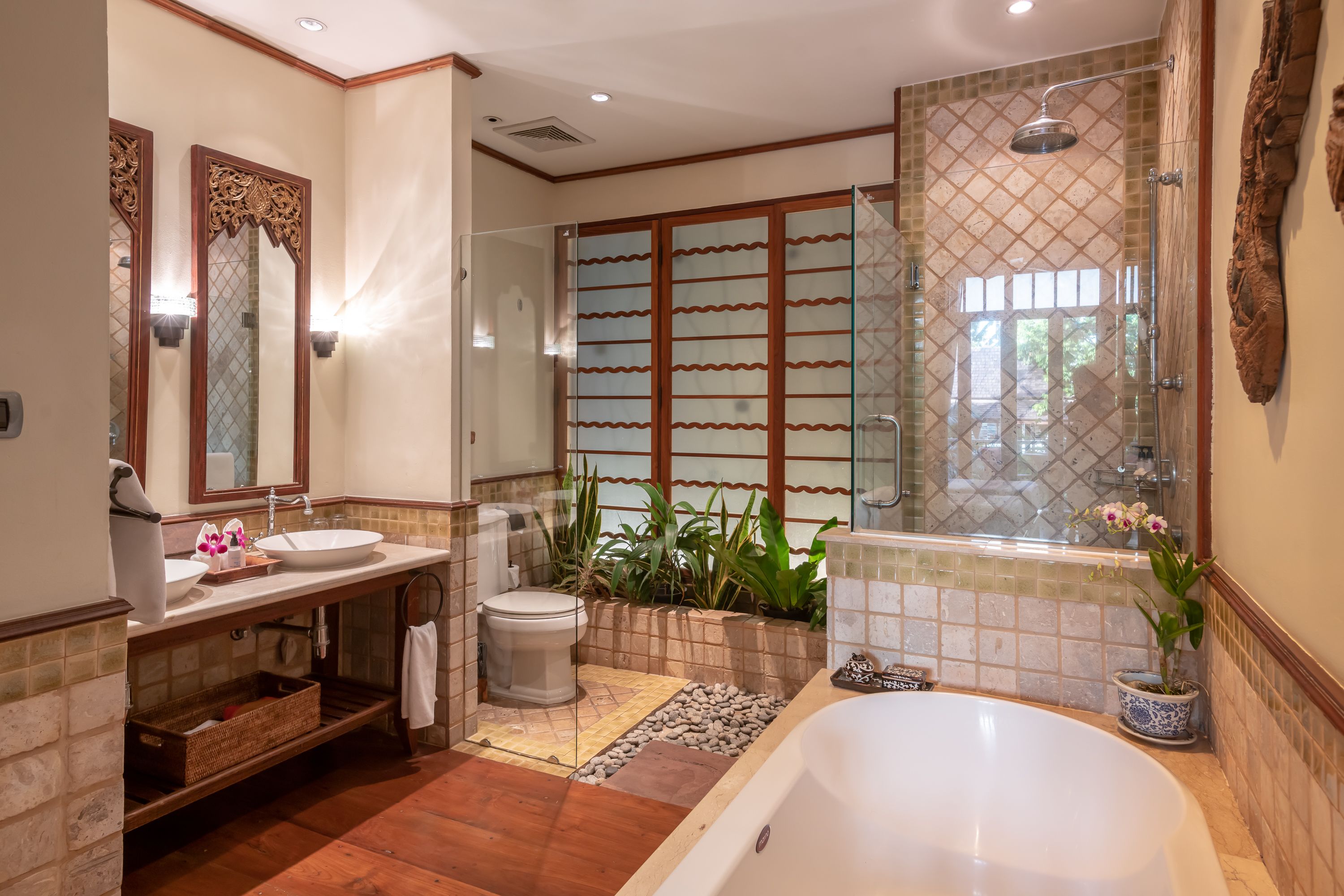 deluxe room | bathroom | separate bathtub and shower, designer toiletries, hair dryer, bathrobes