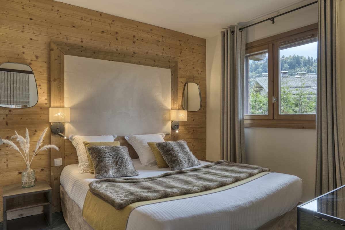 Suite Familiale | Ropa de cama de alta calidad y caja de seguridad en la habitación