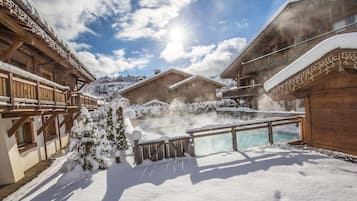 Outdoor pool, open 10:00 AM to 9:00 PM, pool umbrellas, pool loungers