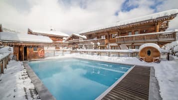 Outdoor pool, open 10:00 AM to 9:00 PM, pool umbrellas, pool loungers