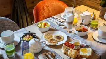 Daily buffet breakfast (EUR 23 per person)