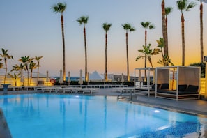 Outdoor pool, pool umbrellas, pool loungers