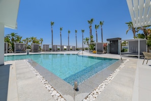 Outdoor pool, pool umbrellas, pool loungers