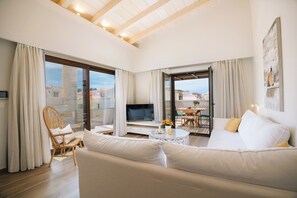 Executive suite | Luxe beddengoed, pillowtop-bedden, een kluis op de kamer