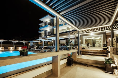 Outdoor pool, open 9:30 AM to 8:30 PM, pool umbrellas, sun loungers