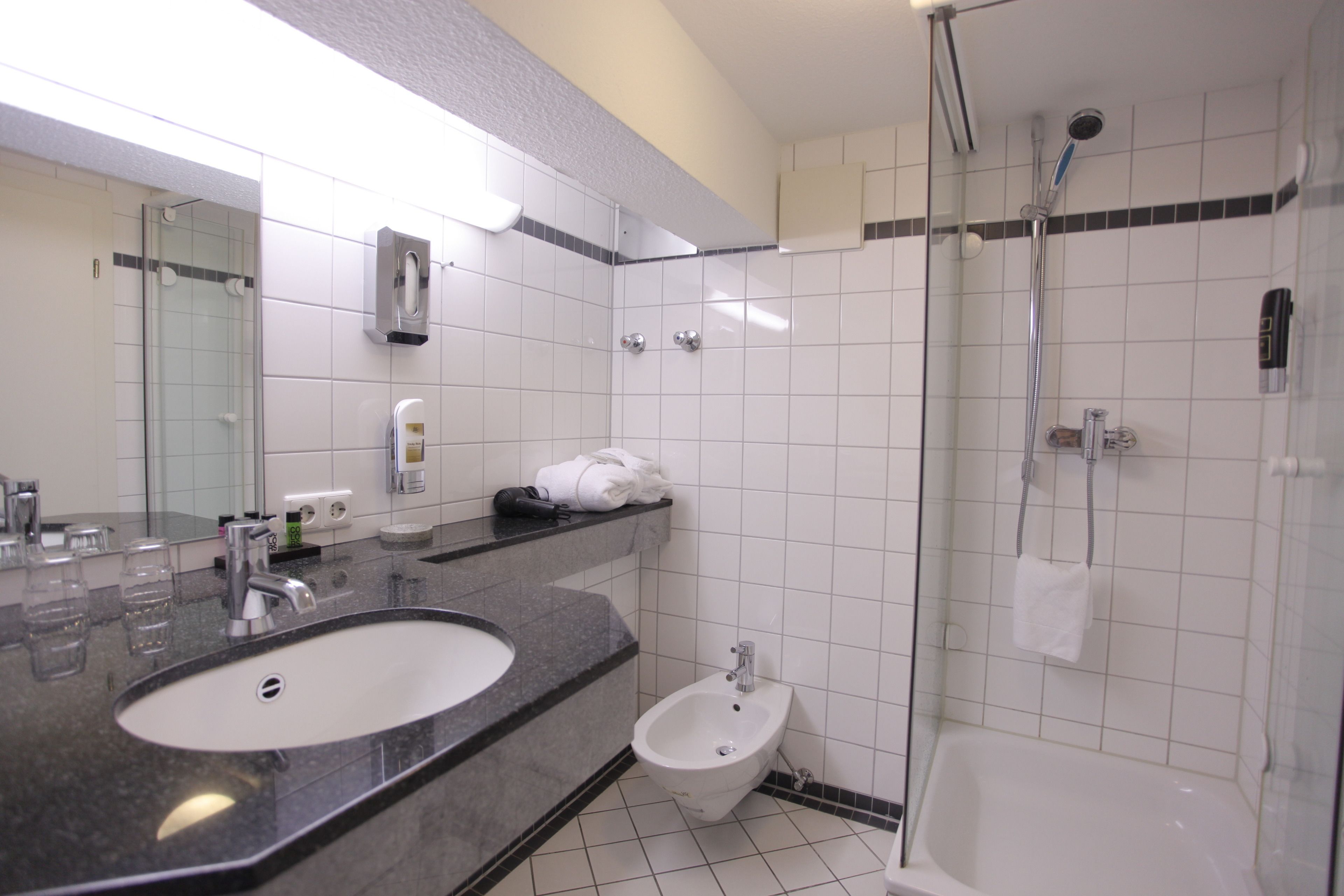 hair dryer, bathrobes, towels