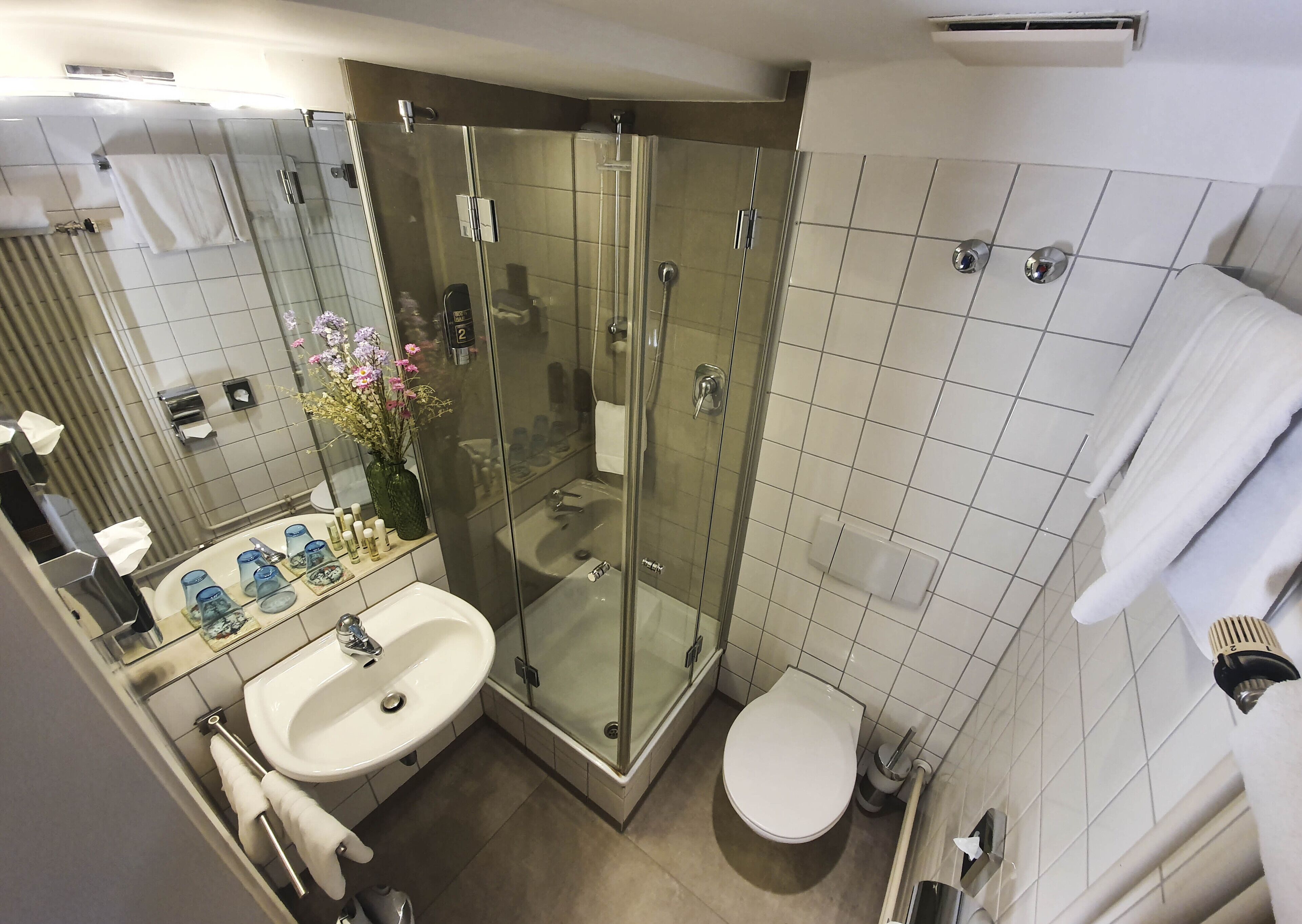 hair dryer, bathrobes, towels