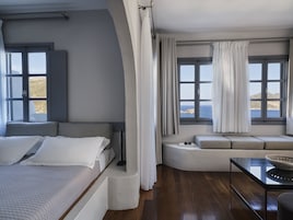 Upper-Level Suite with Sea View for 2 | Minibar, in-room safe, individually decorated, free WiFi