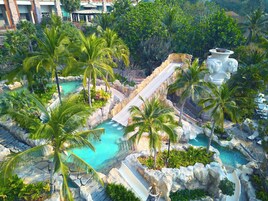 4 outdoor pools, open 7:00 AM to 6:00 PM, pool umbrellas, sun loungers