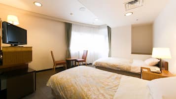 Tabla de planchar con plancha, wifi gratis y ropa de cama