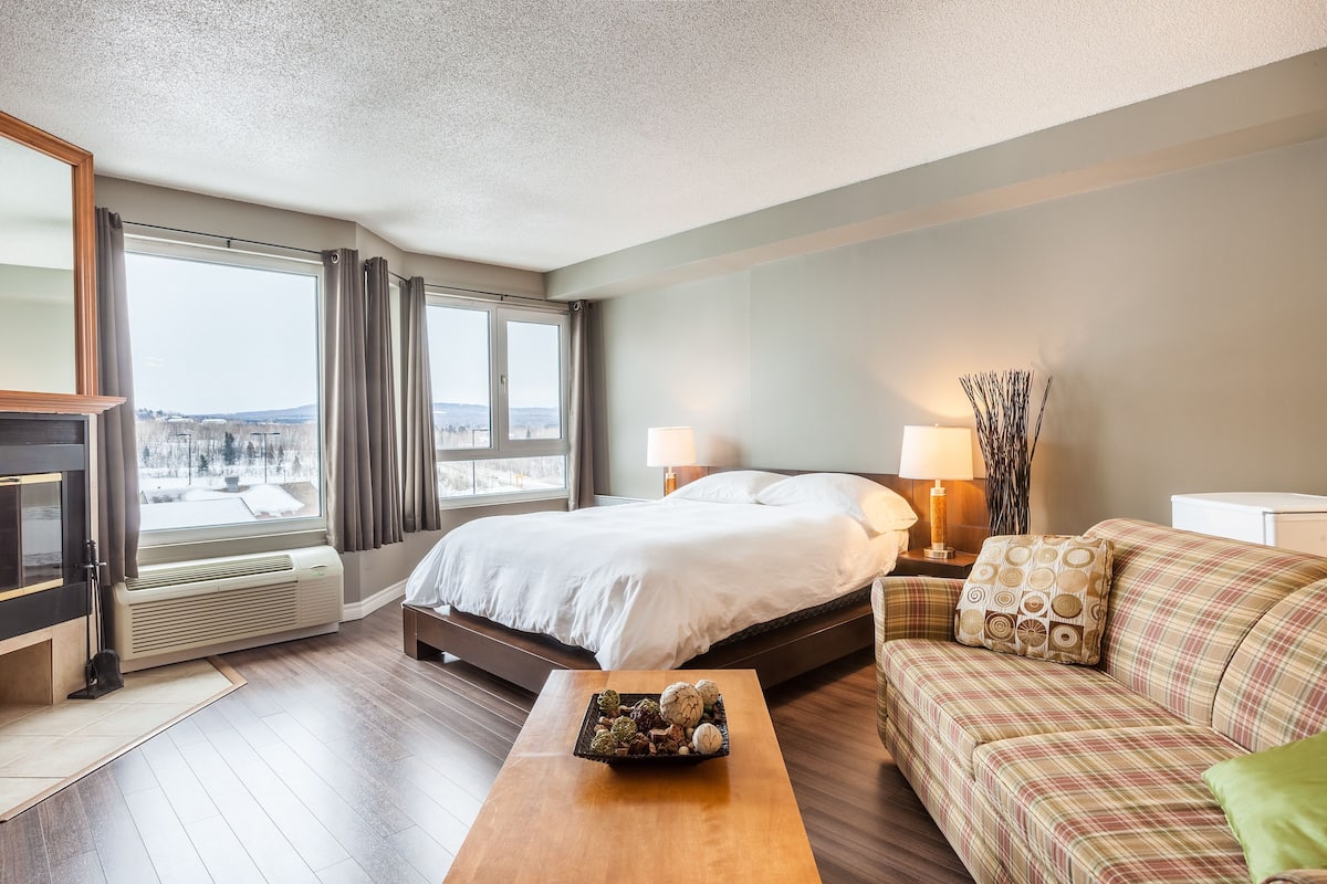 Hypo-allergenic bedding, blackout curtains, iron/ironing board