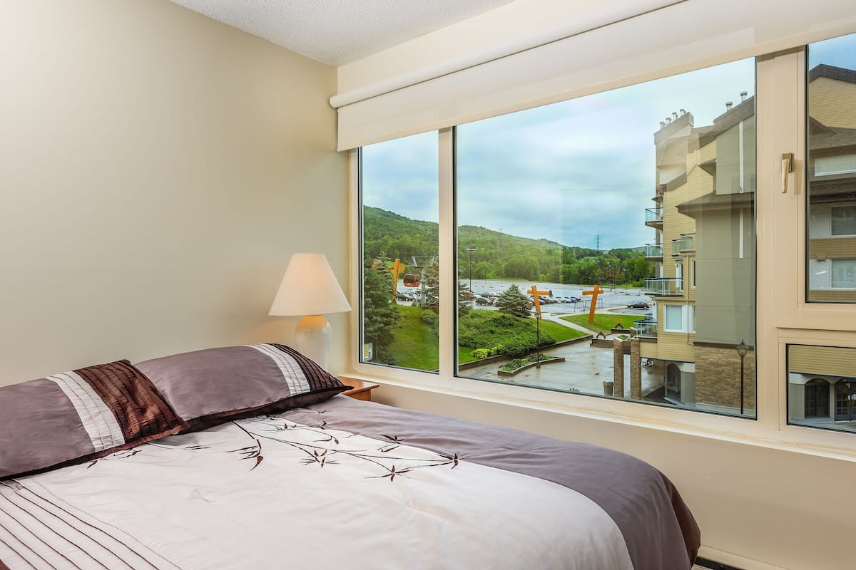 Hypo-allergenic bedding, blackout curtains, iron/ironing board