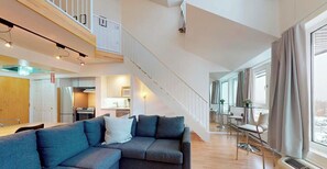Superior Condo, 1 Bedroom (Mezzanine - Ski-in/Ski-out) | Living area | 32-inch TV with cable channels - Hébergement Mont-Sainte-Anne (Beaupre)