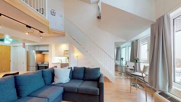 Superior Condo, 1 Bedroom (Mezzanine - Ski-in/Ski-out) | Living area | 32-inch TV with cable channels