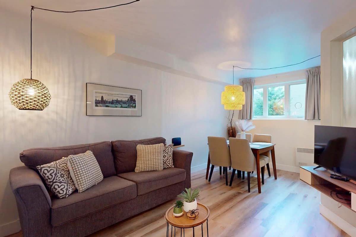 Condo, 1 Bedroom (semi-basement - 1km from slopes) | Living area | 32-inch TV with cable channels