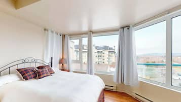 Appartement, 2 chambres (Ski-in/Ski-out) | Literie hypoallergénique, rideaux occultants, fer et planche à repasser