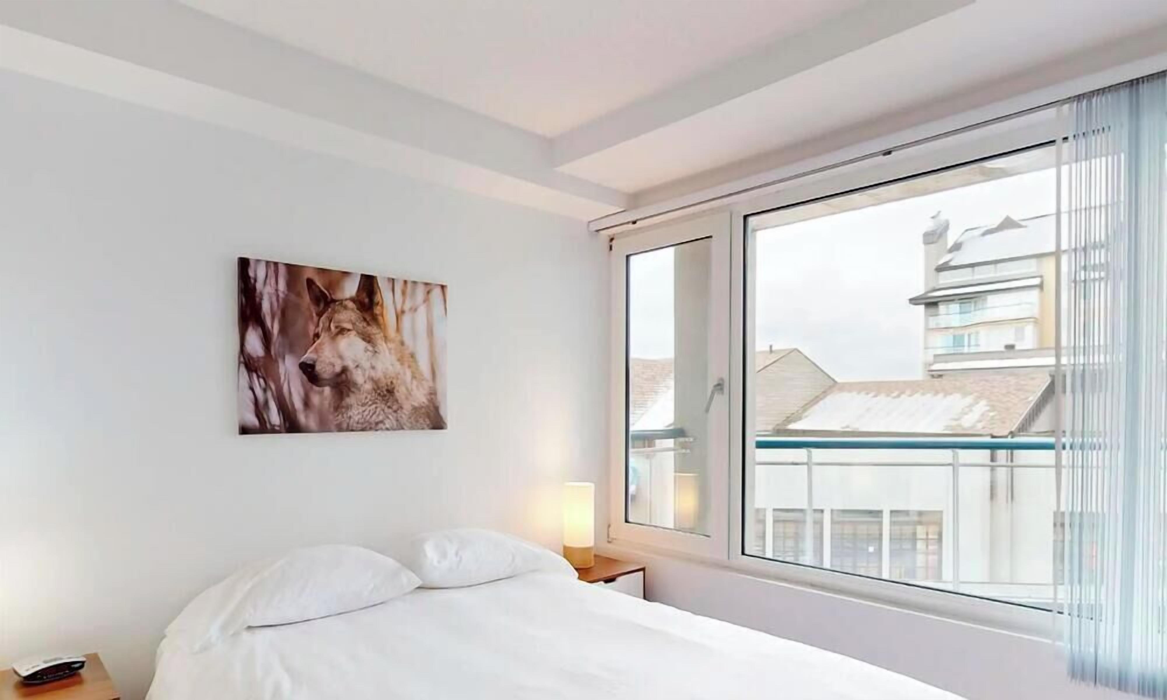 Hypo-allergenic bedding, blackout curtains, iron/ironing board