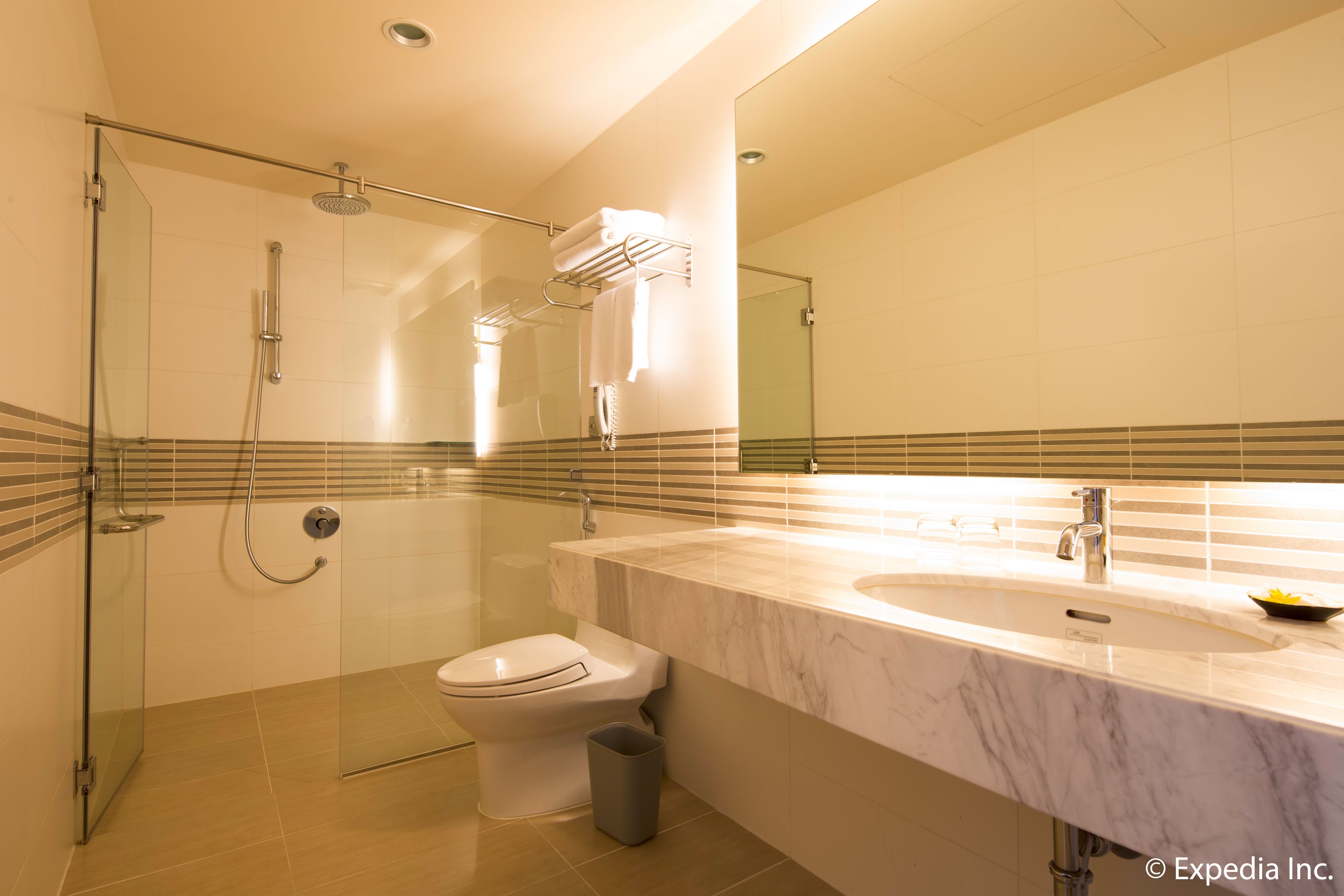 premier room | bathroom | eco-friendly toiletries, hair dryer, slippers, bidet