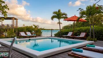 Outdoor pool, pool umbrellas, sun loungers