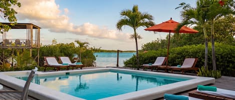 Outdoor pool, pool umbrellas, sun loungers
