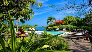 Outdoor pool, pool umbrellas, pool loungers