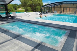Indoor pool, 2 outdoor pools, pool umbrellas, pool loungers
