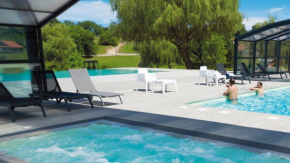 Indoor pool, 2 outdoor pools, pool umbrellas, pool loungers