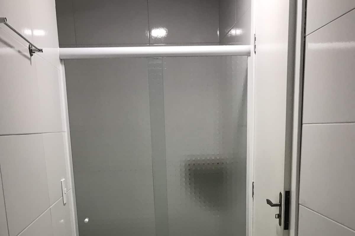 Shower, free toiletries, towels, toilet paper
