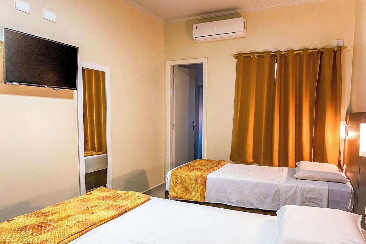 Triple Room | Minibar, in-room safe, WiFi (free), bed sheets