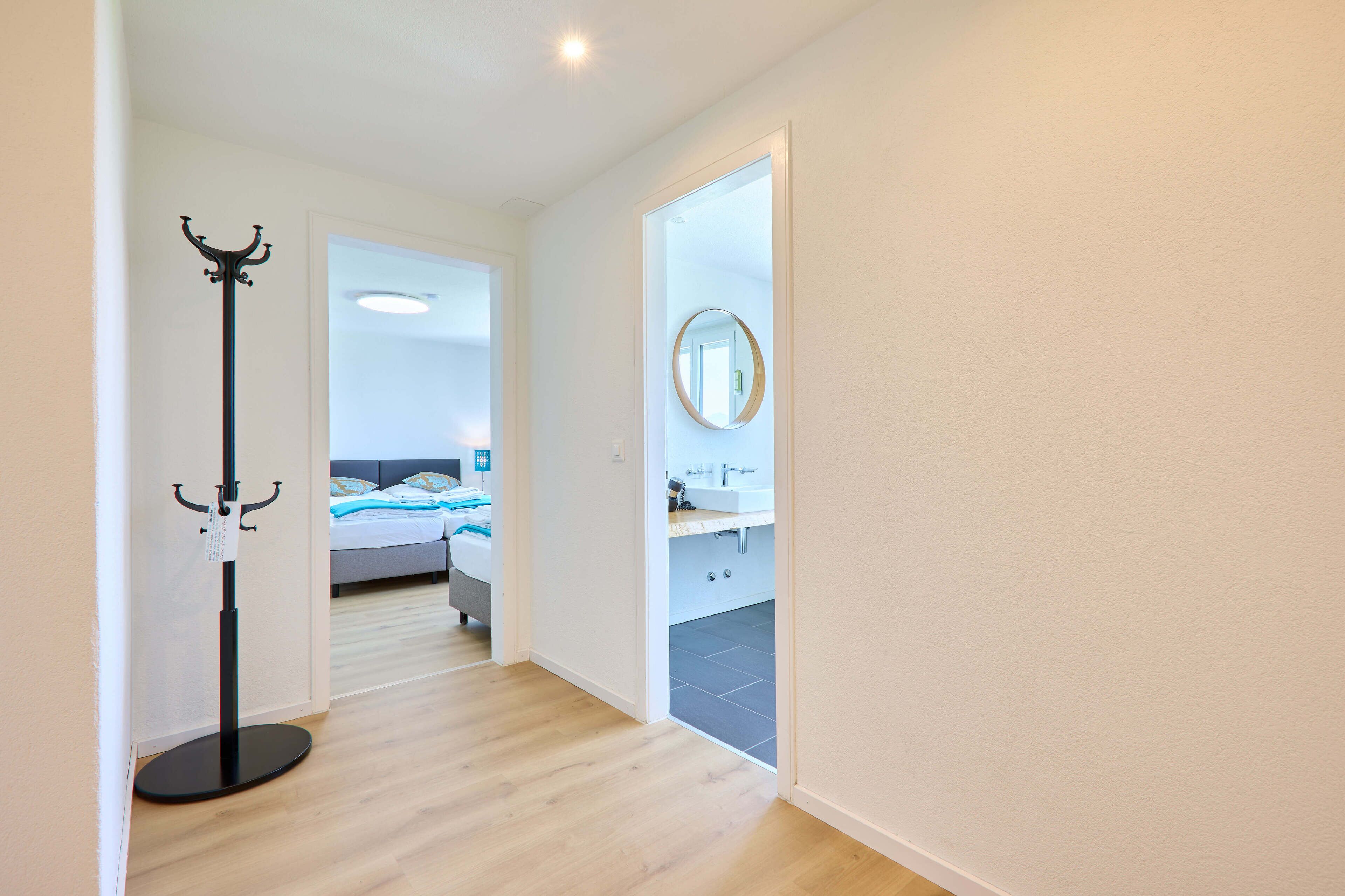 triple room | living area | flat-screen tv