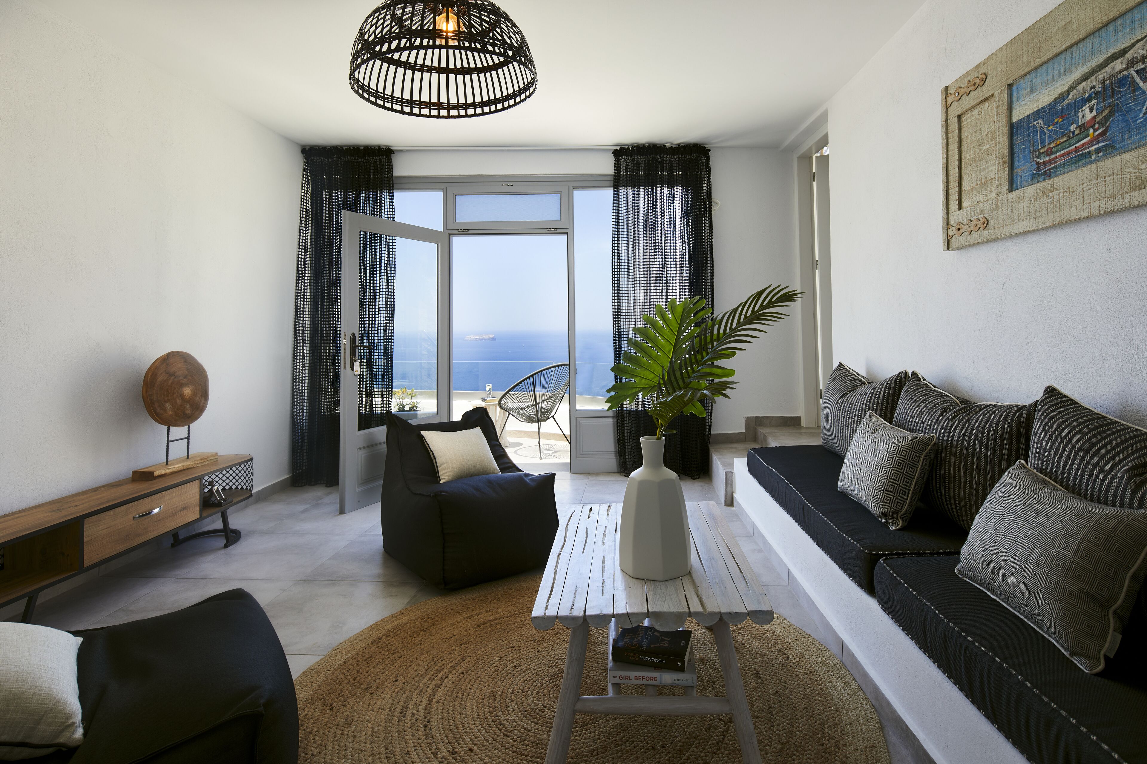 two bedroom villa with indoor private cave pool | living area | flat-screen tv, dvd player, computer