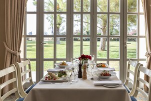 Breakfast, lunch, dinner served; international cuisine, garden views
