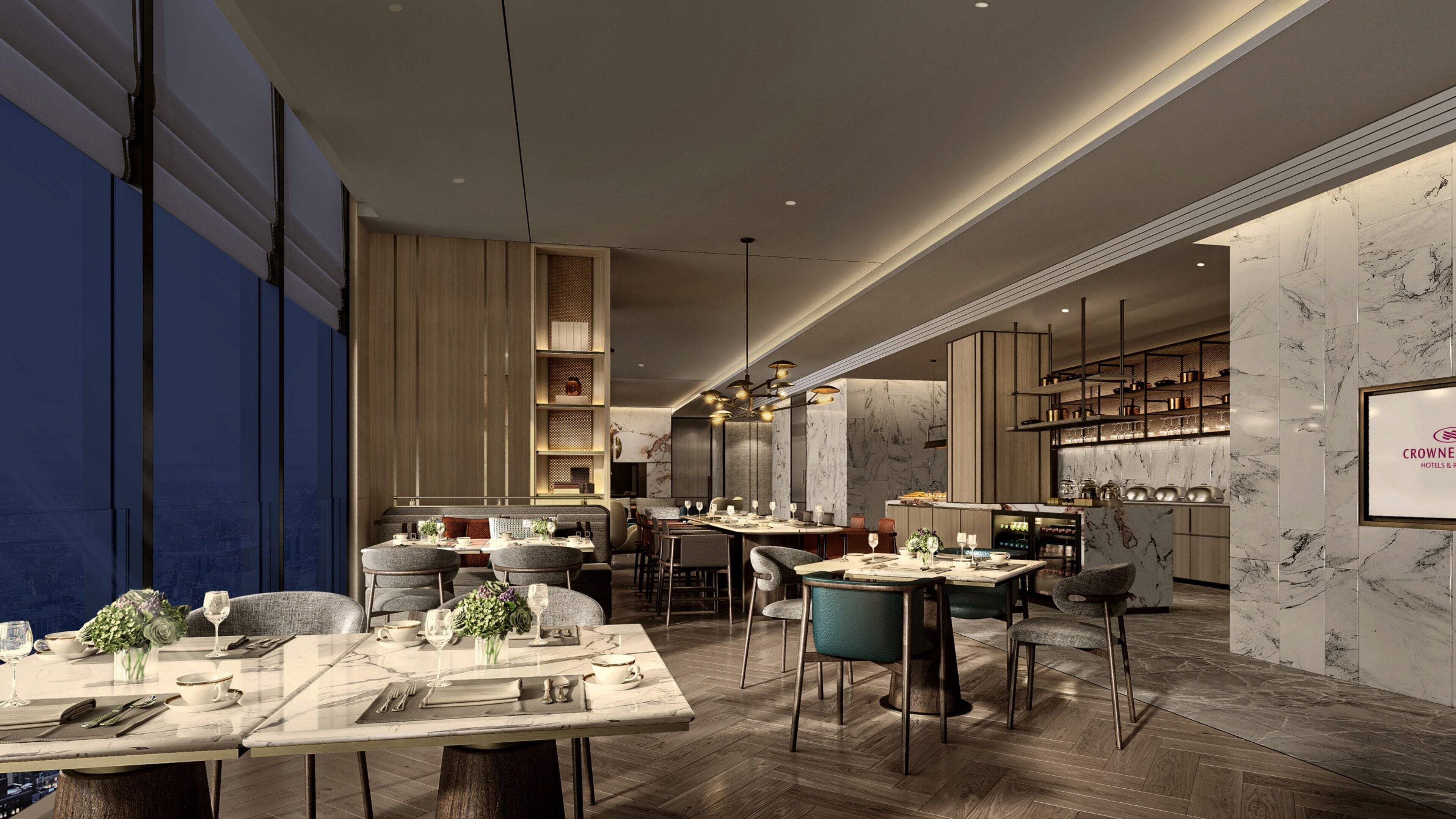A modern restaurant with marble walls, wooden accents, and a variety of seating options.