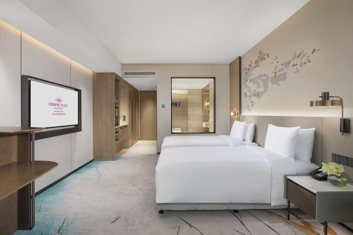 Premium bedding, down comforters, pillowtop beds, minibar