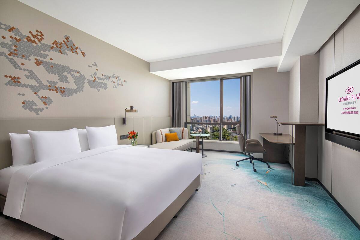 Premium bedding, down comforters, pillowtop beds, minibar
