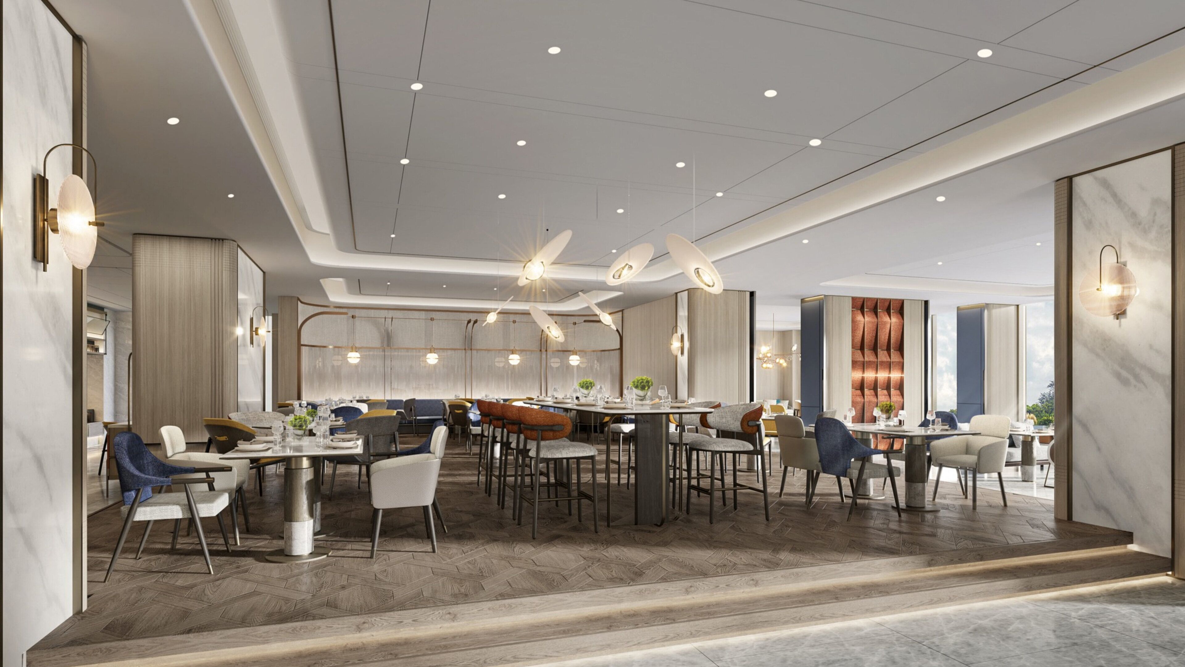 Een modern restaurant met een centrale eetruimte, meerdere tafels en eigentijdse verlichtingsarmaturen.