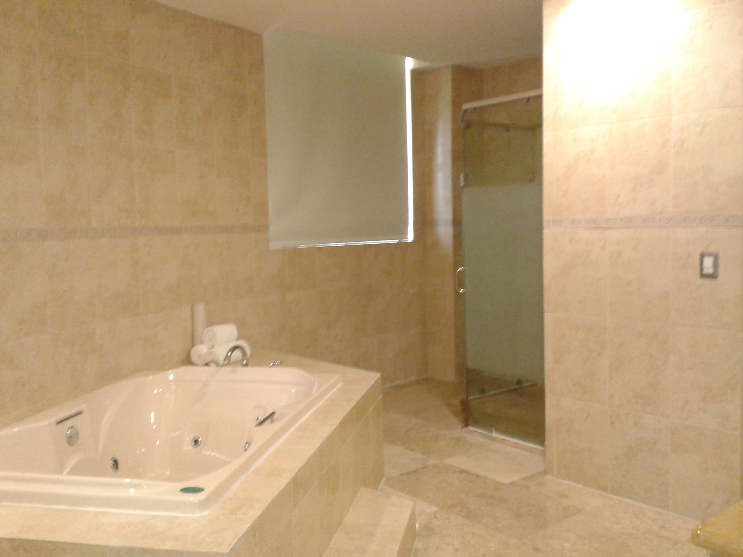 deluxe quadruple room | jetted bathtub