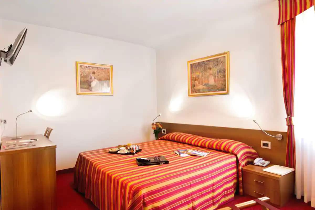 Premium bedding, down duvets, minibar, in-room safe