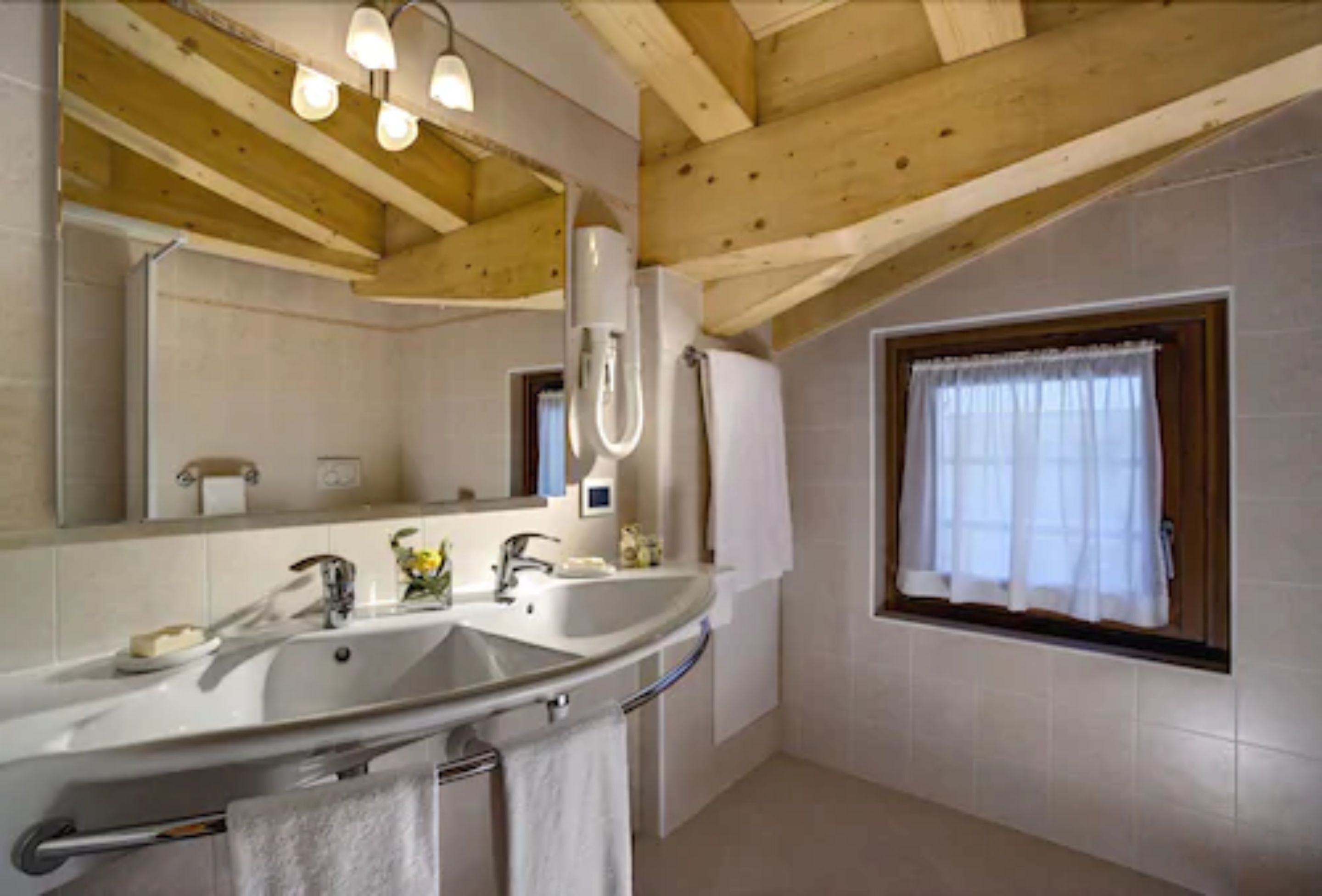 superior double room, mountain view (free access wellness centre) | bathroom | shower, eco-friendly toiletries, hair dryer, bathrobes