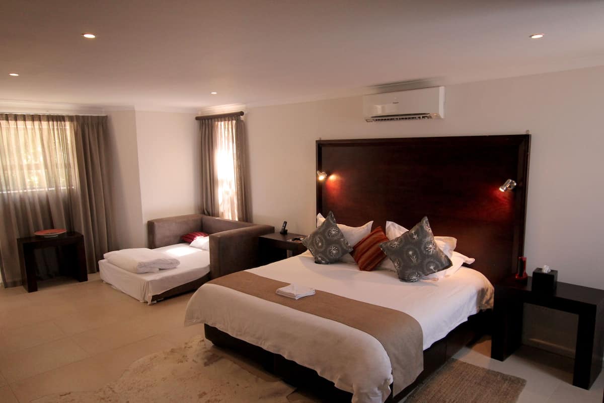 Minibar, in-room safe, desk, rollaway beds