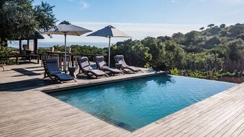 2 outdoor pools, pool umbrellas, sun loungers