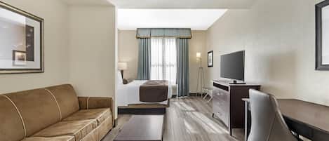 Suite, 1 King Bed, Non Smoking, Refrigerator & Microwave (with Sofabed) | In-room safe, desk, laptop workspace, soundproofing