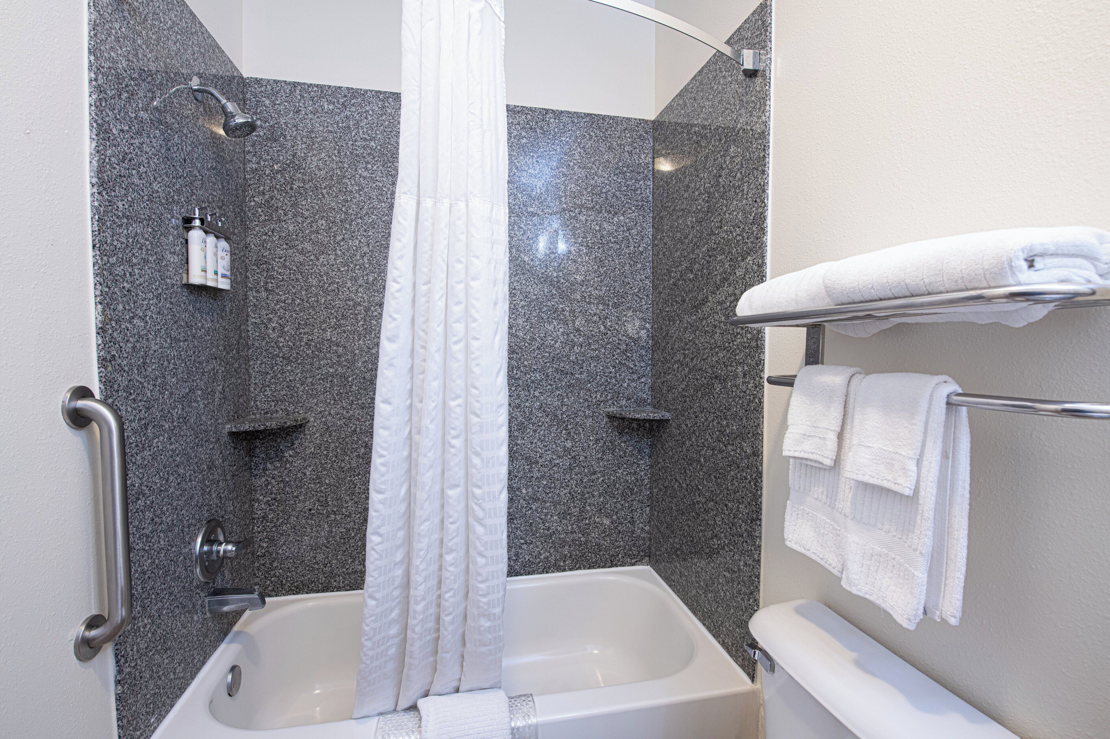 combined shower/bathtub, free toiletries, hair dryer, towels