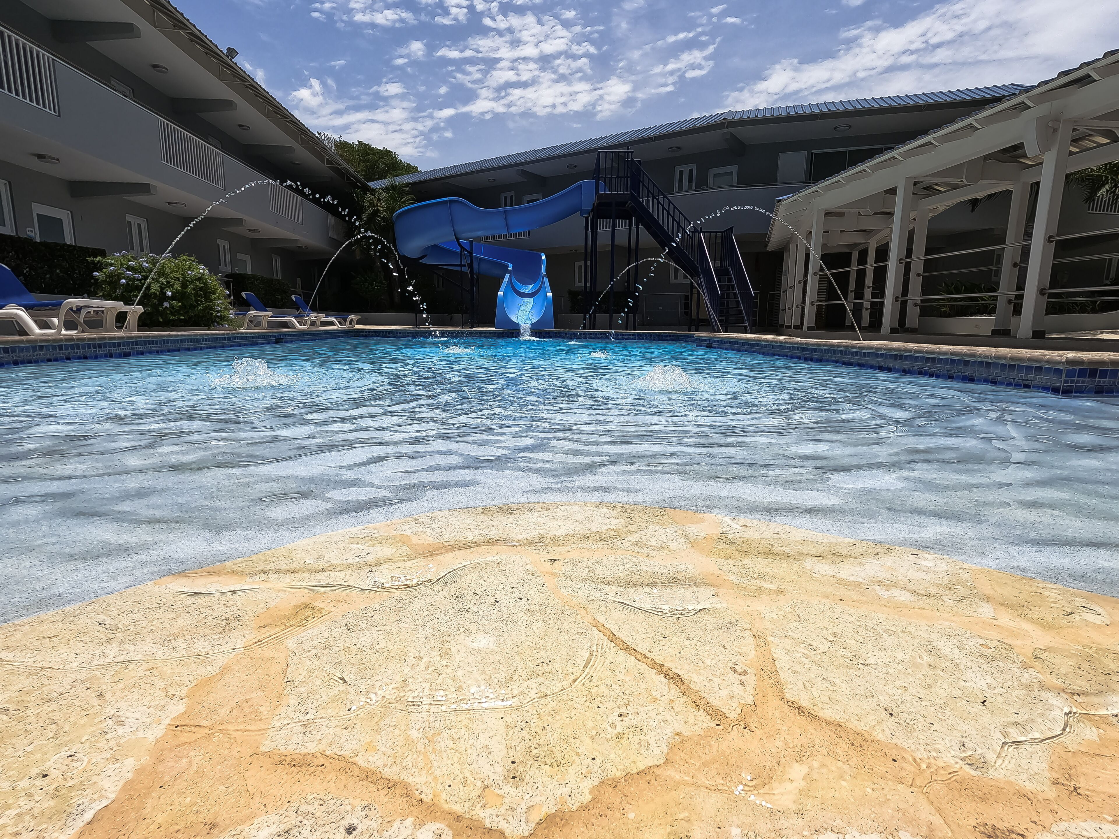 2 outdoor pools, pool umbrellas, pool loungers