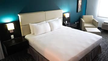Down comforters, pillowtop beds, in-room safe, desk