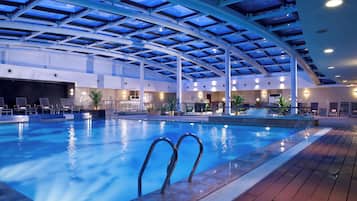 Indoor pool, open 6:00 AM to 11:00 PM, pool loungers