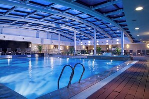 Indoor pool, open 6:00 AM to 11:00 PM, pool loungers